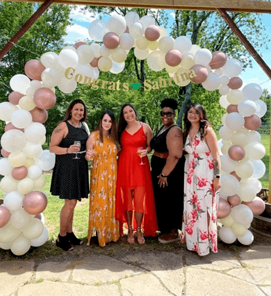 Sabrina and her sisters with their best friends for the past 20+ years at the graduation party they threw for her!