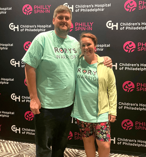 A woman and a man posing for a picture.